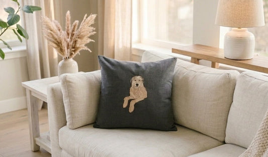 Personalized embroidered dog portrait pillow on a couch, handmade canvas cover with durable soft texture, custom pet gift ships in 7 to 9 business days